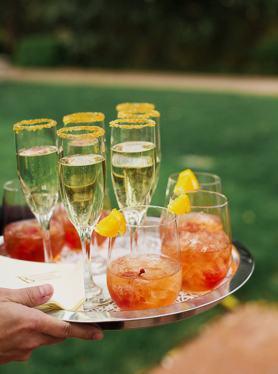 Sugar-rimmed glasses with specialty wedding cocktails