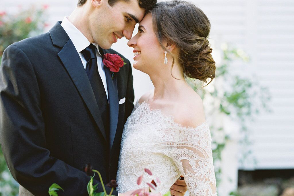 Bride and groom take a wedding day portrait at Dallas Heritage Village