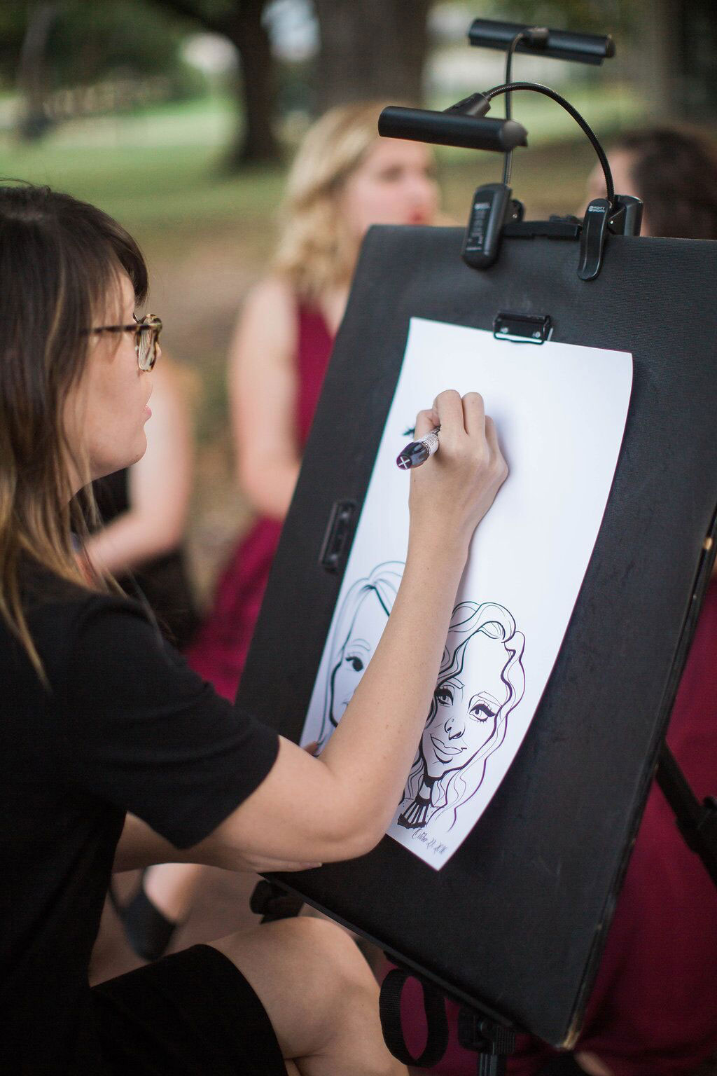 Caricature artist at Dallas wedding reception