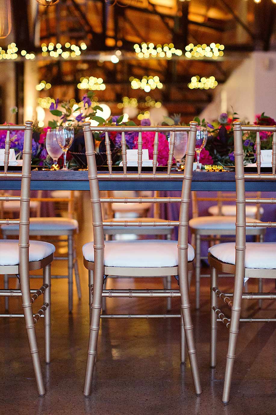 Gold chiavari chairs and wedding head table