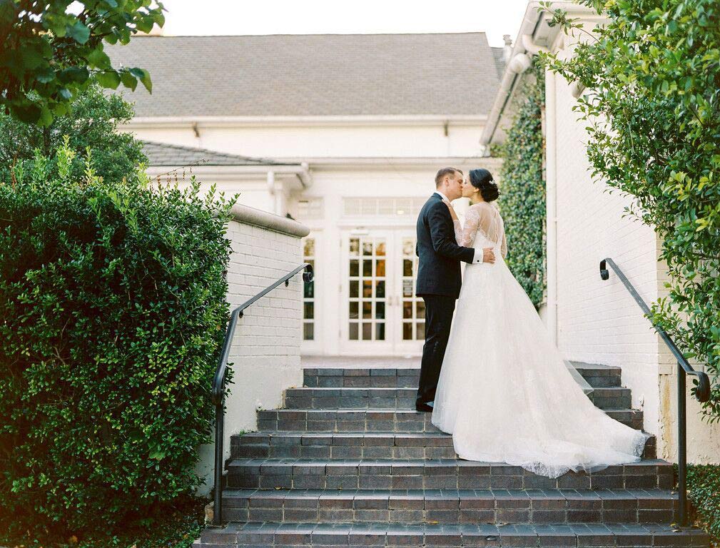 Bride and groom take a wedding day portrait at Arlington Hall Dallas