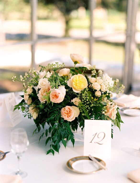 Peach and white low lush wedding centerpiece