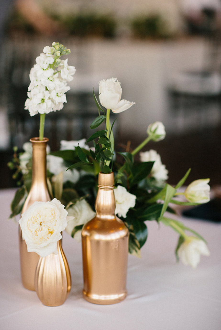 Gold bottle wedding centerpiece collection