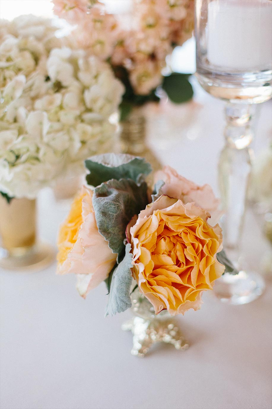 Yellow floral wedding centerpiece detail