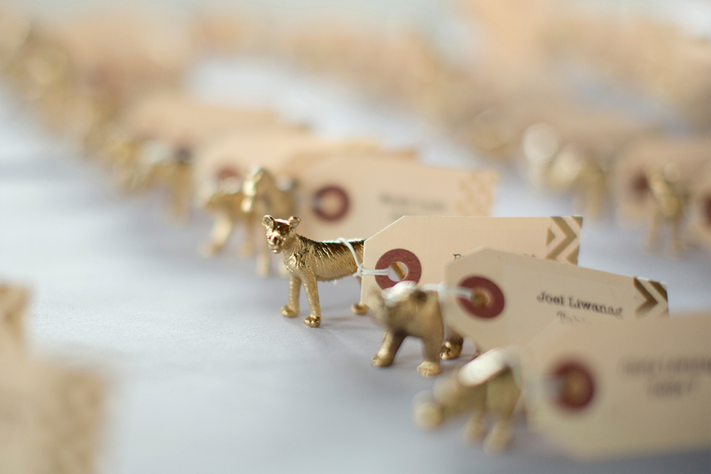 Gold animal wedding reception escort cards