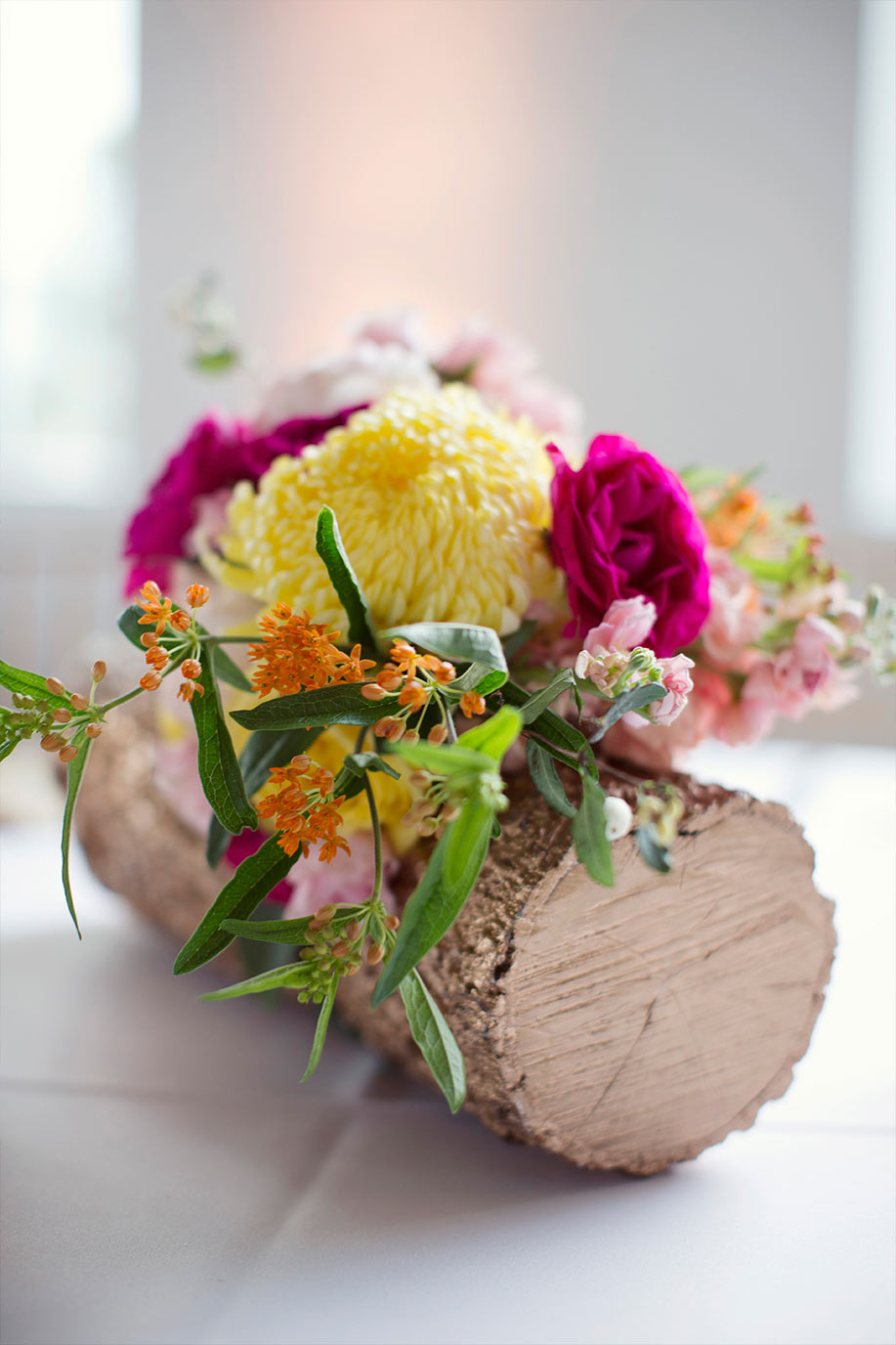 Gold log wedding centerpiece