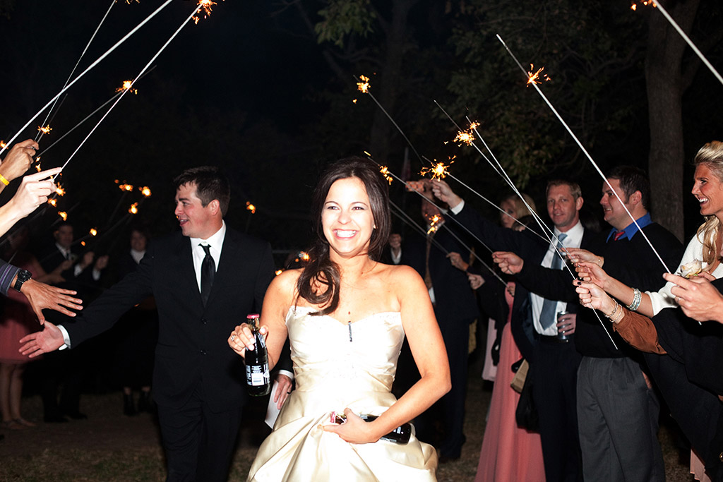 bride and groom grand exit with sparklers and Dr Pepper