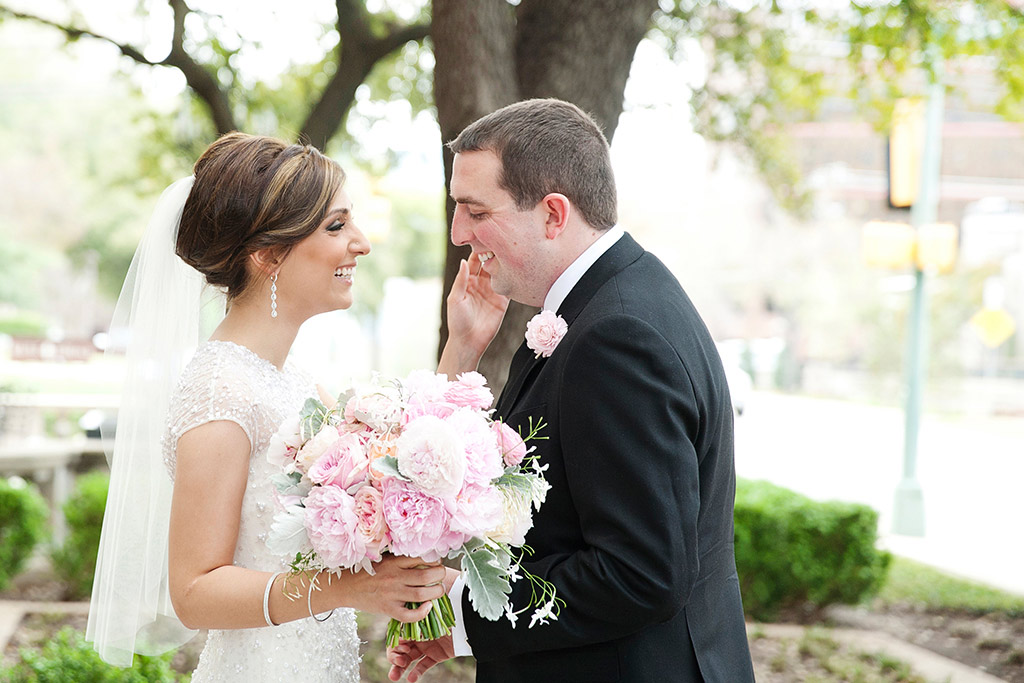 Bride and groom take a wedding day portrait