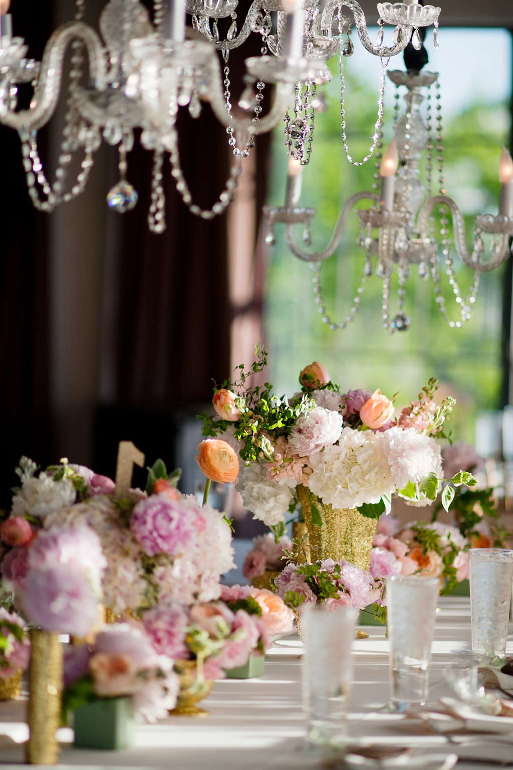 Chandelier above Wedding Reception Table